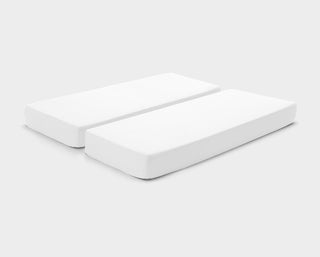 It-Fits fitted sheets for adjustable beds in White on a split king mattress, illustrating corners that won’t pop off with deep pockets.
