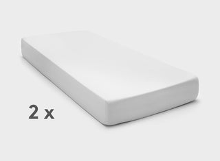 It-Fits fitted sheets for adjustable beds in White on a split king mattress, illustrating corners that won’t pop off with deep pockets.