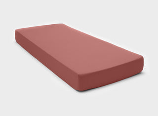 It-Fits fitted bed sheet in vintage rose, perfectly displayed on an Australian Standard mattress with deep pockets against a plain background.