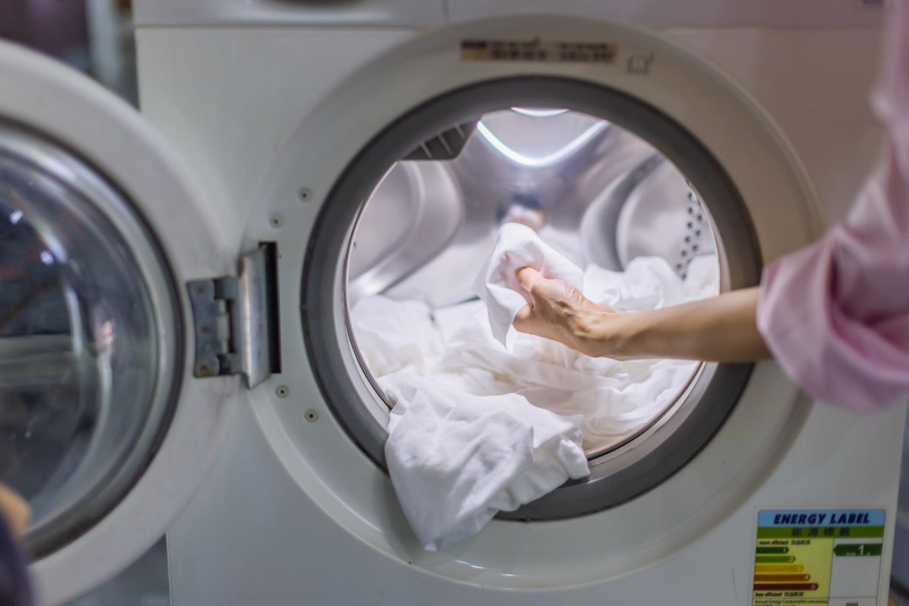 It-Fits® soft jersey cotton fitted sheet inside a washing machine