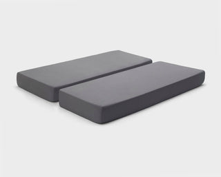 Charcoal Grey fitted sheets by It-Fits for adjustable beds, shown on a split king mattress with deep pockets against a plain background.