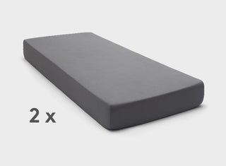 Charcoal Grey fitted sheets by It-Fits for adjustable beds, shown on a split king mattress with deep pockets against a plain background.