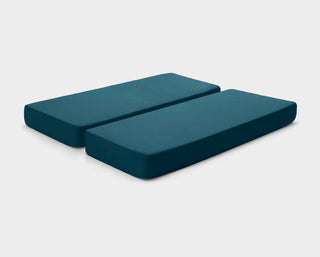 Adjustable bed fitted sheets by It-Fits in Petrol green colour, shown on a split king mattress with deep pockets against a plain background.