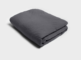 Folded doona with quilt cover in charcoal grey by It-Fits, featuring a high-quality zipper closure, crafted from breathable 100% Australian cotton jersey.
