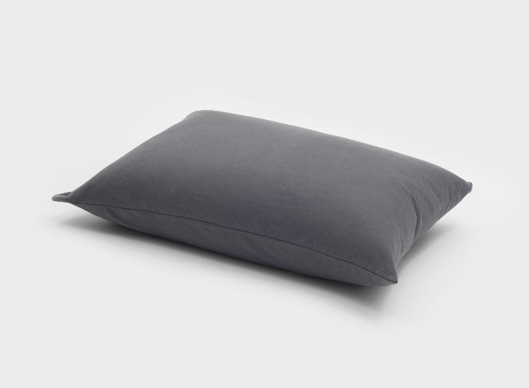 Cotton jersey pillow slip in charcoal grey displayed on a pillow, made from soft breathable 100% Australian cotton jersey by It-Fits, one pack.