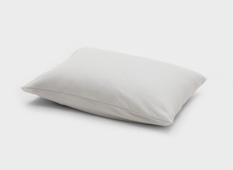 It-Fits 100% Australian cotton jersey pillowcase in beige displayed on a pillow, for soft and breathable comfort, one pack.