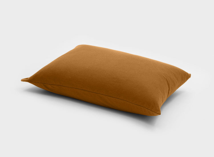 Skin-friendly light pink jersey pillow slip by It-Fits, crafted from soft 100% Australian cotton, displayed on a pillow, one pack.