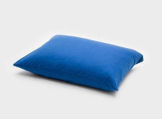 Featuring a navy blue colour, this It-Fits pillowcase crafted from smooth Australian cotton jersey is displayed on a pillow, one pack.
